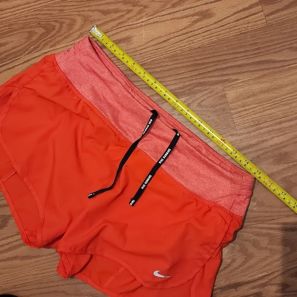 Nike running shorts med‎